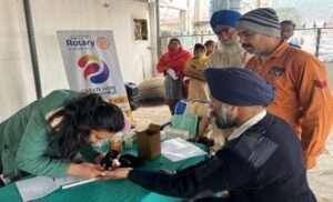 Pharmacicts checking BP at Rotary Eye Camp 